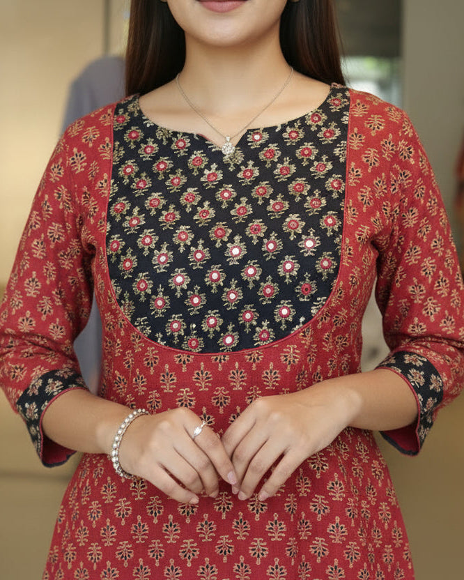 Floral patterned dress on a mannequin in a store setting